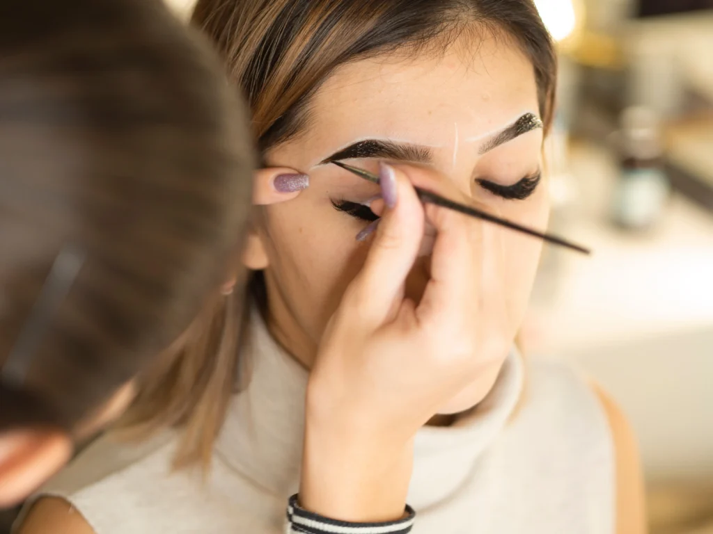Lady Getting Brow Tinting Services at Divine Medspa in Ormond Beach
