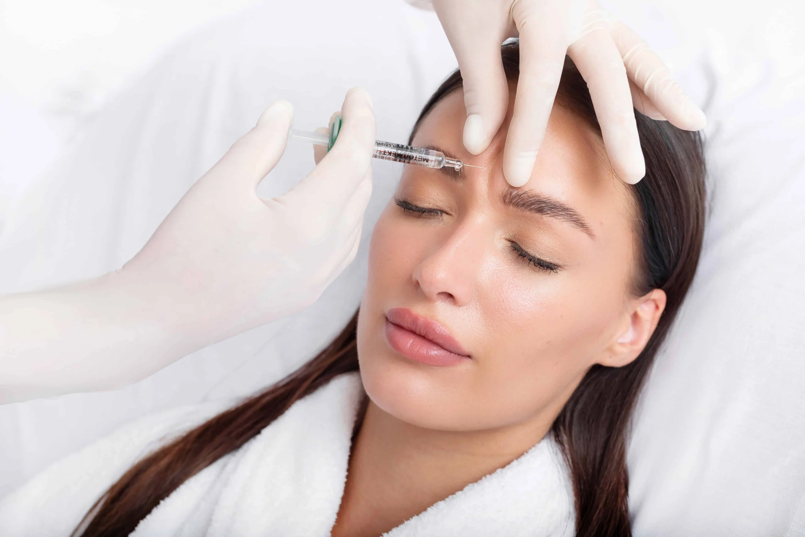 Lady receiving xeomin injectable in ormond beact at Divine Medspa